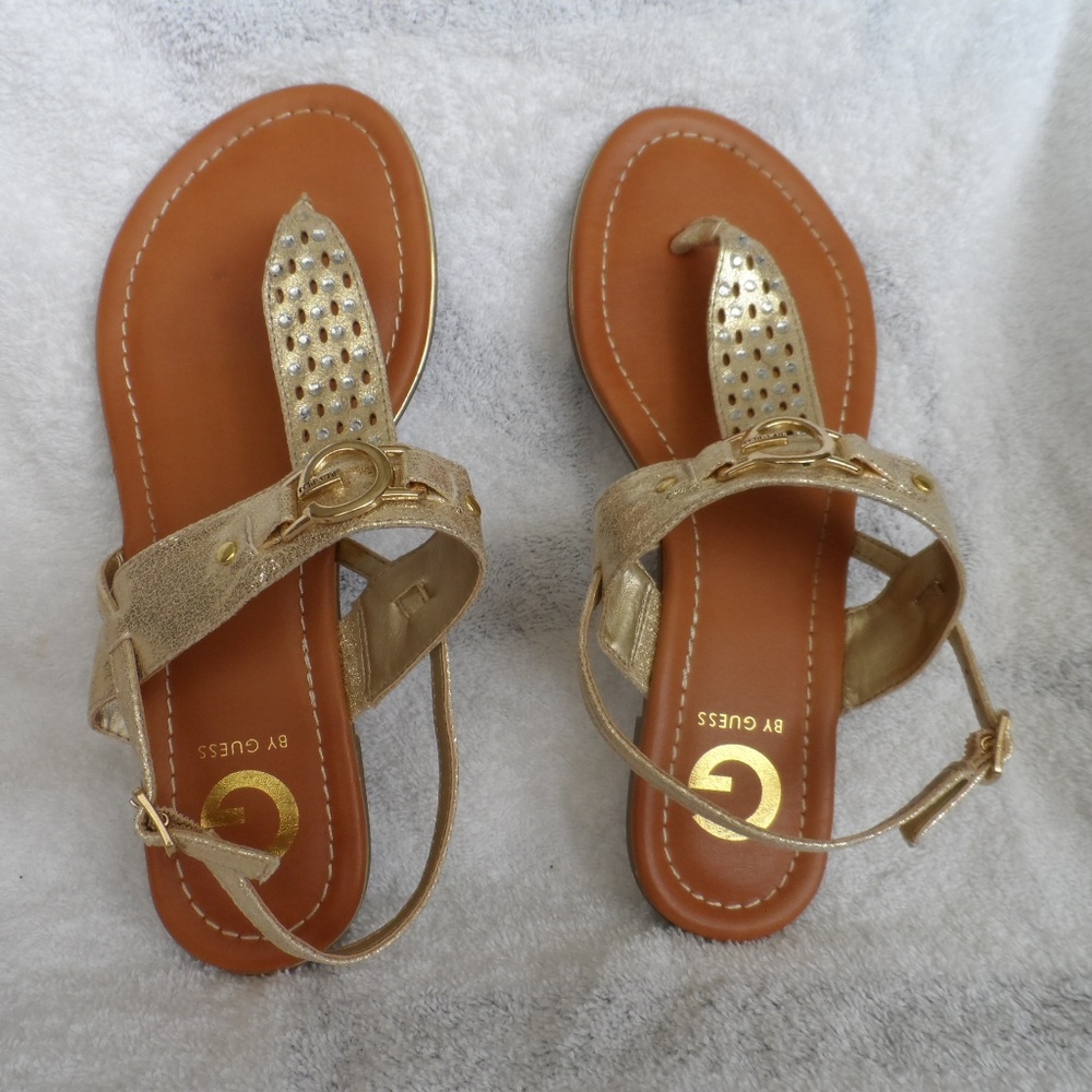 Ladies size 7M Gold T strap sandal by Guess